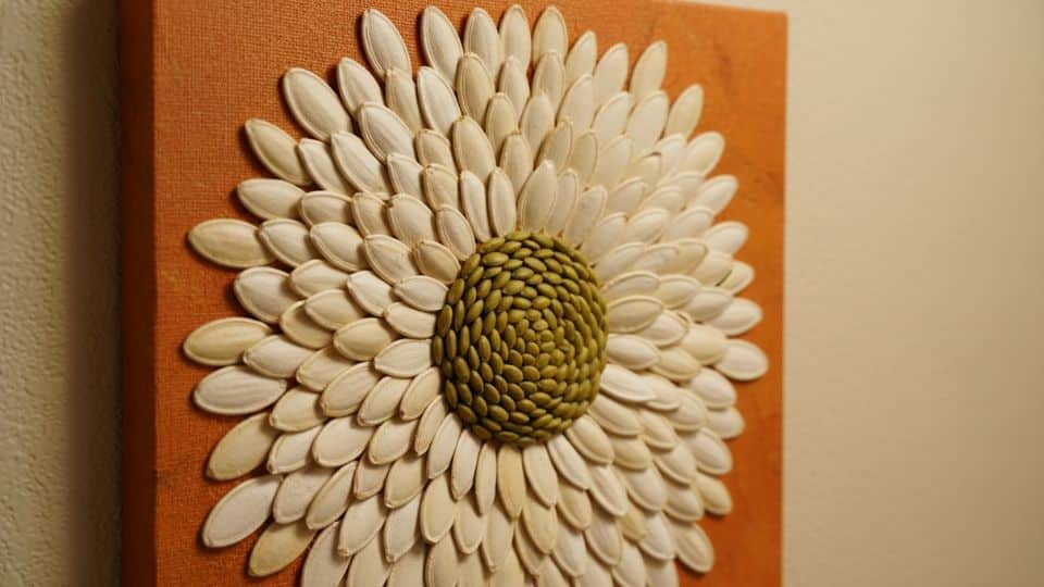 pumpkin seed mosaic art colorful seeds on fall canvas