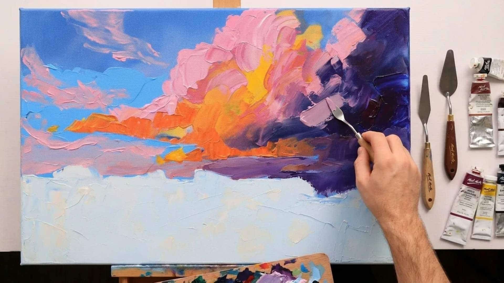Palette knife painting in progress with vibrant colors.
